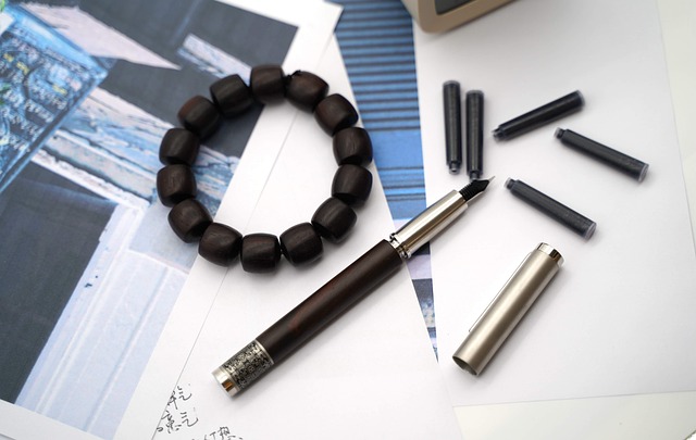 Calligraphy desk with pens ink bottle and blotter